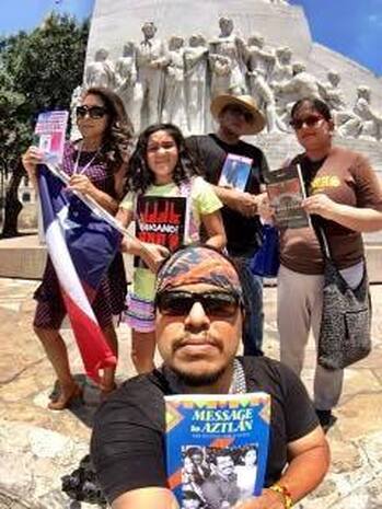 librotraficantes holding banned books