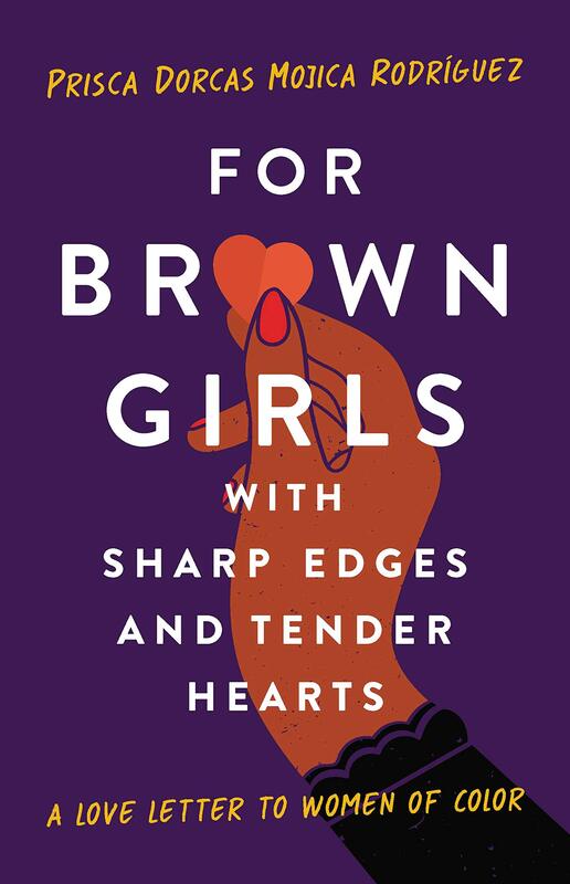 For brown girls with sharp edges book cover. A brown hand is holding a small heart