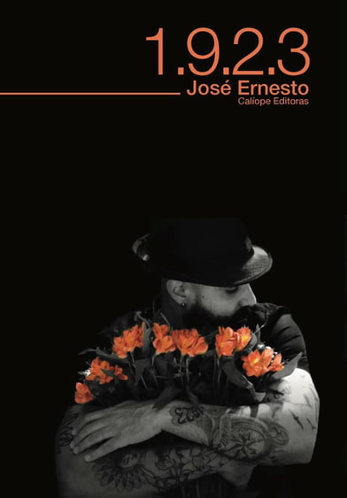 Front cover of the book titled 1.9.2.3. It has a black cover and a picture of Jose Ernesto holding flowers
