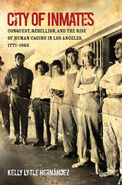 Book cover of City of Inmates: Conquest, Rebellion and the rise of human caging in los angeles 1771-1965. Seven men standing in front of cells in jail.