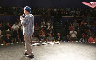 a man talking to an audience